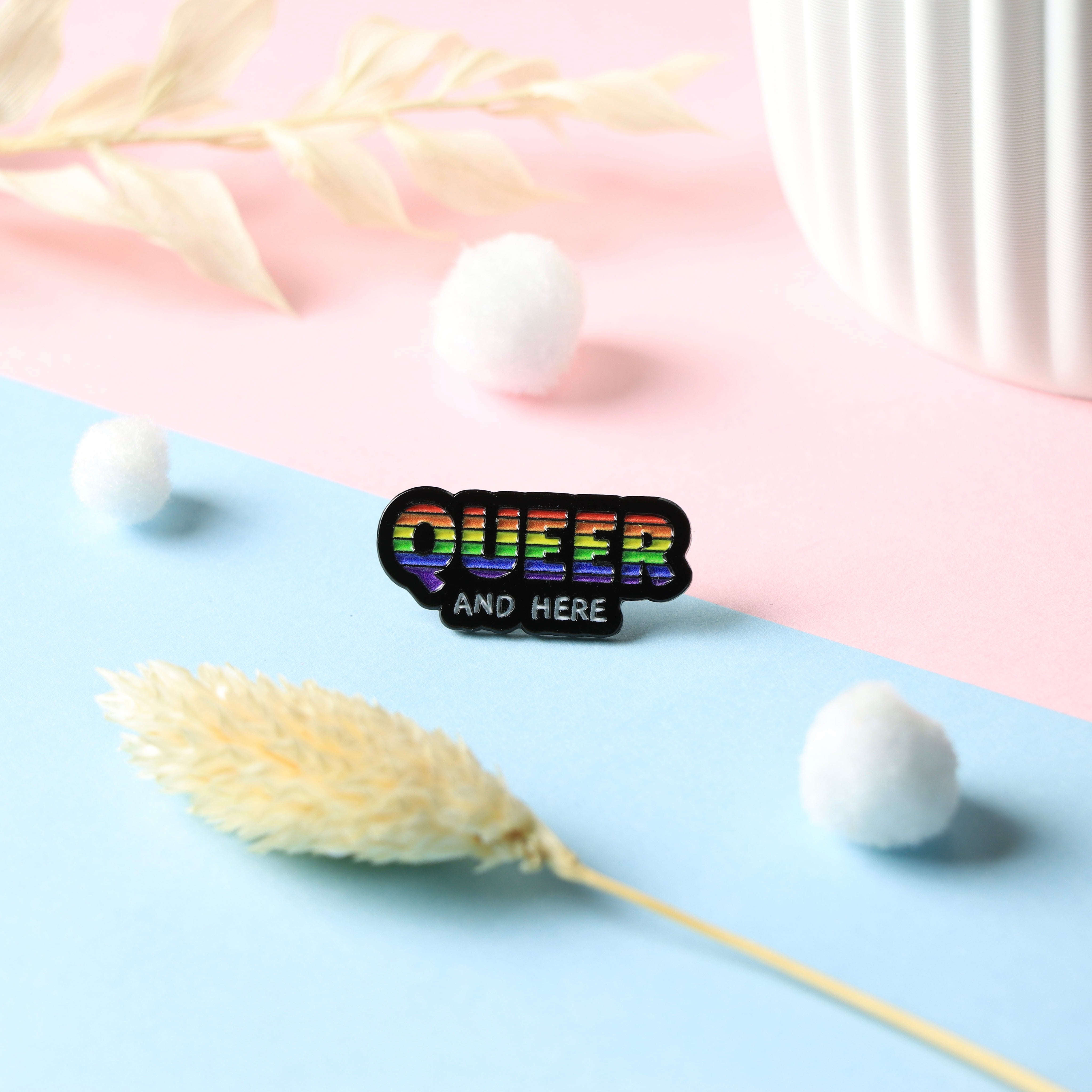 "Queer and here" Pin